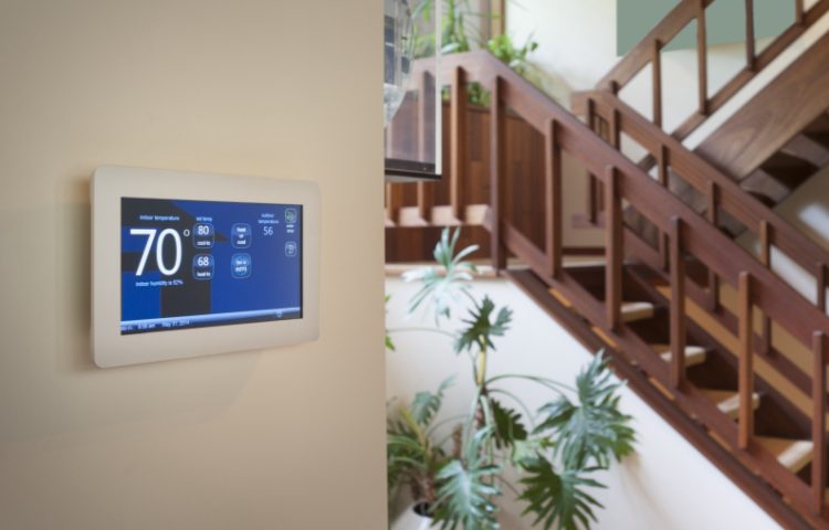 thermostat showing ideal temperature of a house